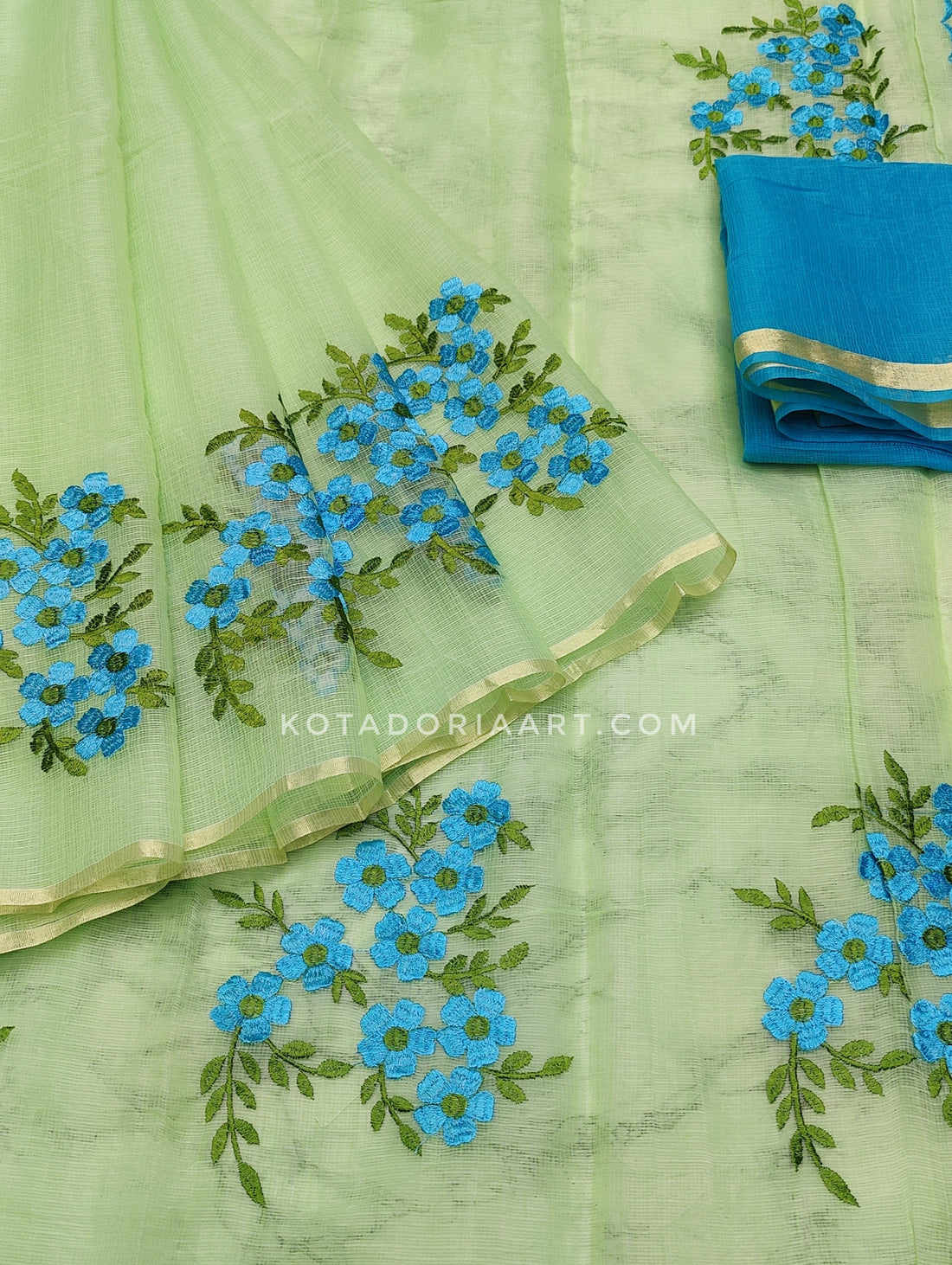 Green Cotton Kota Doria Embroidery Work Saree With Contrast Blouse Piece